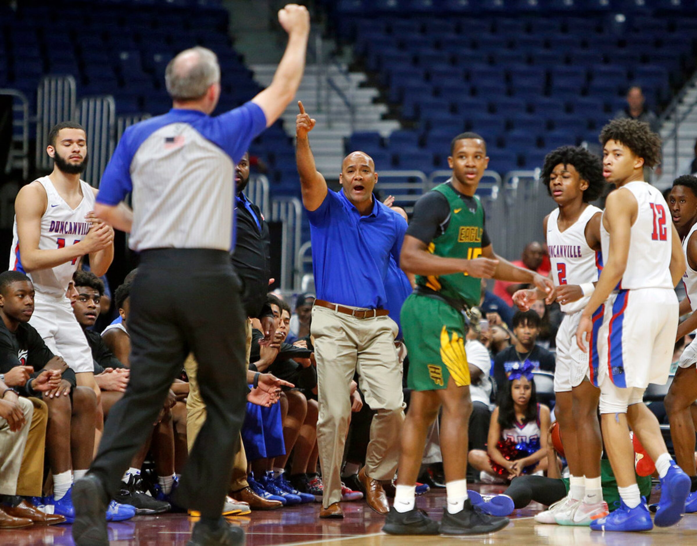 Duncanville head coach David Peavy tries to get the call to go his wayUIL boys basketball 6A...