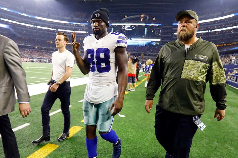 Dallas Cowboys wide receiver Dez Bryant (88) walks to the locker room after sustaining an...