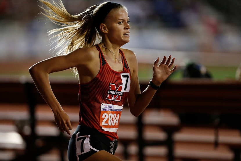 Flower Mound Marcus' Quinn Owen (2834) finishes first in the class 6A girls 1600-meter run...