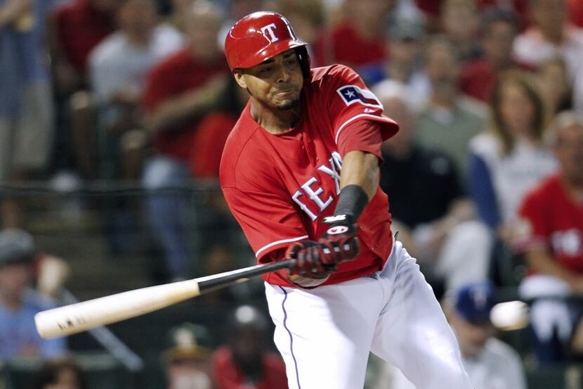 Texas Rangers' Nelson Cruz lines out against the Tampa Bay Rays during the second inning of...