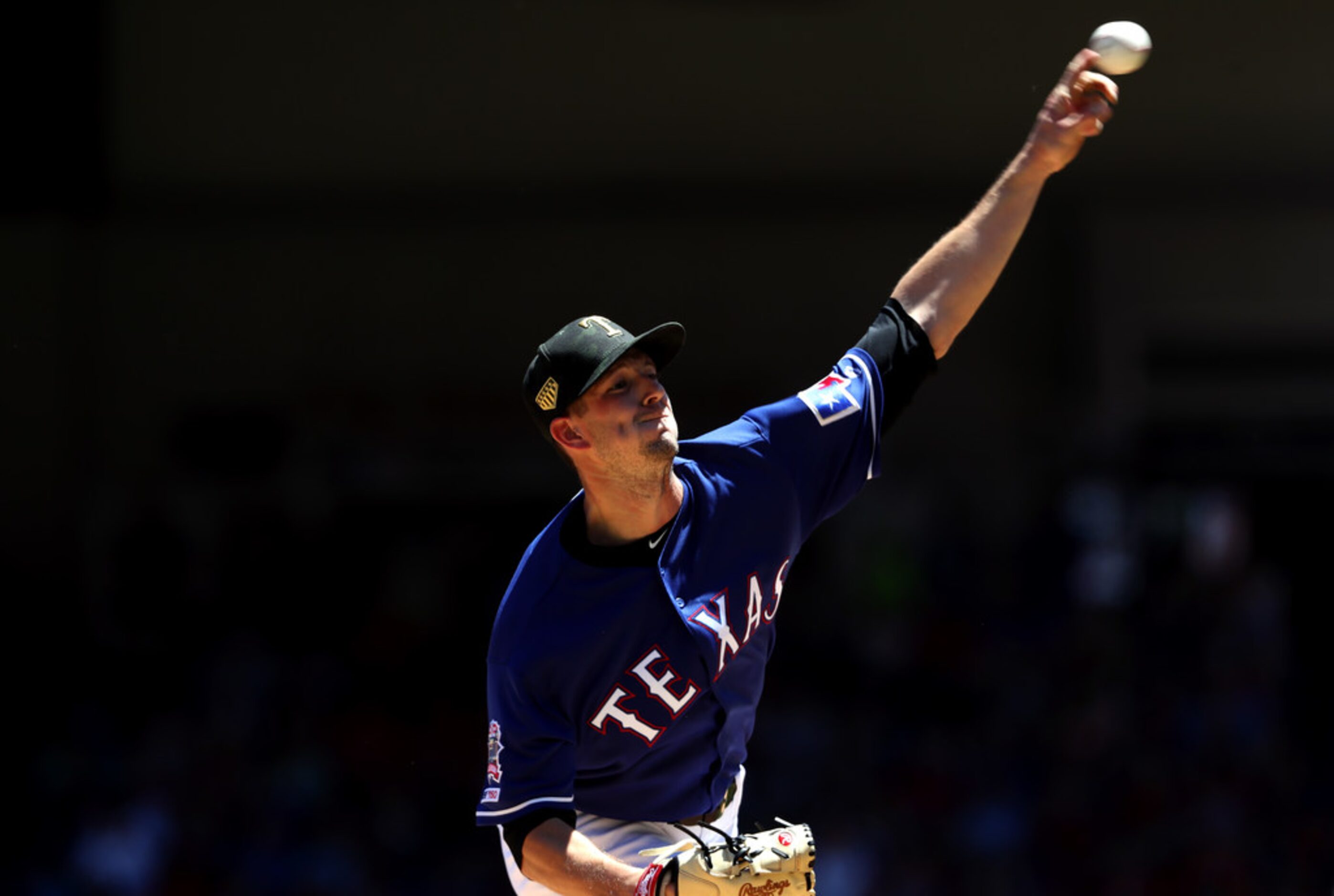 ARLINGTON, TEXAS - MAY 19: Drew Smyly #33 of the Texas Rangers throws against the St. Louis...