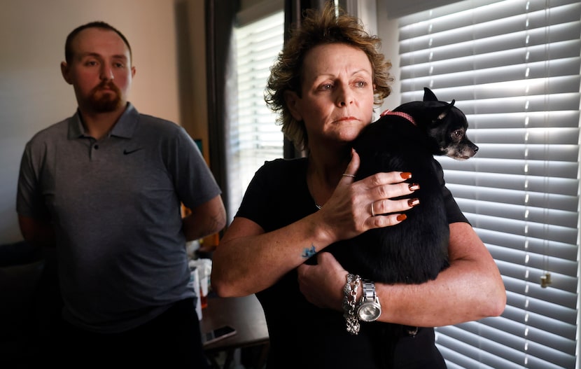 Suzette Kilbreath, with her dog Pistola, and her son Jared Kilbreath pose for a photo at her...