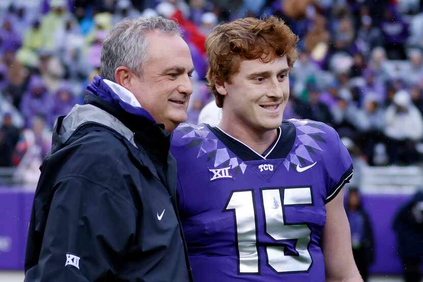 TCU Horned Frogs quarterback Max Duggan (15) poses for a photo with head coach Sonny Dykes...