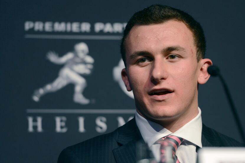 Texas A&M quarterback Johnny Manziel speaks during a news conference prior to the...
