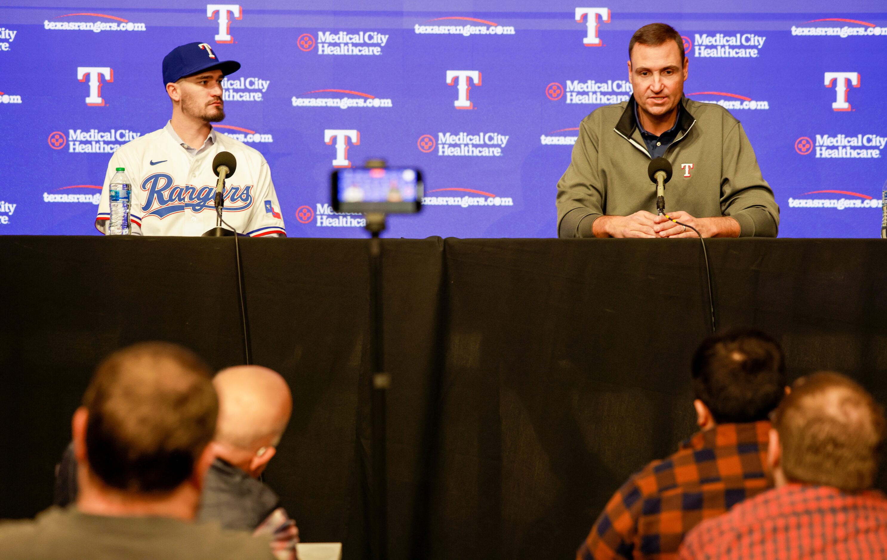 Pitcher Andrew Heaney (left) is introduced by Texas Rangers general manager Chris Young...