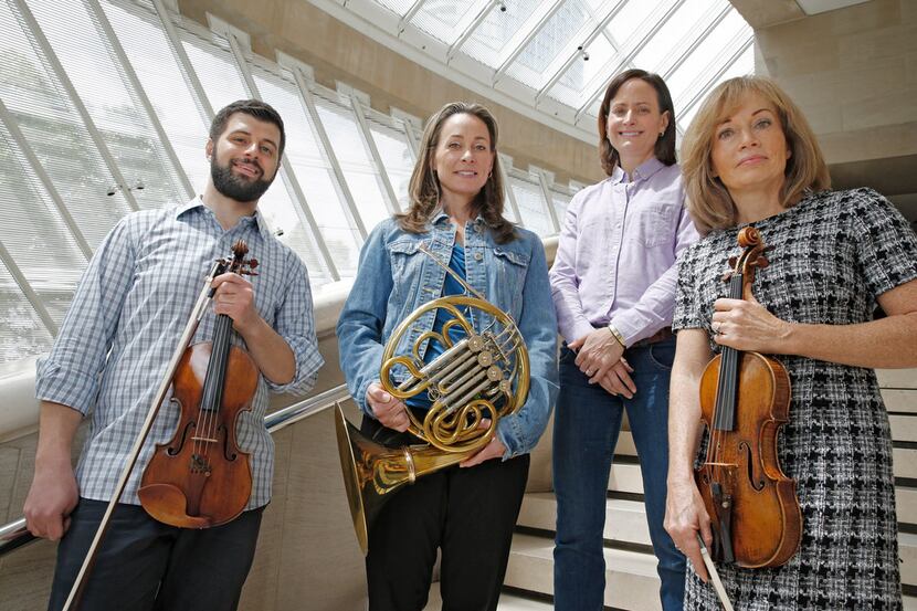Dallas Symphony Orchestra members Nathan Olson (from left), Haley Hoops, Erin Hannigan and...