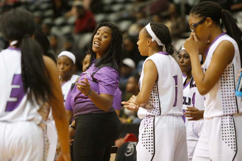 Lincoln coach LaJeanna Howard speaks with her players during a game against Skyline in 2017....