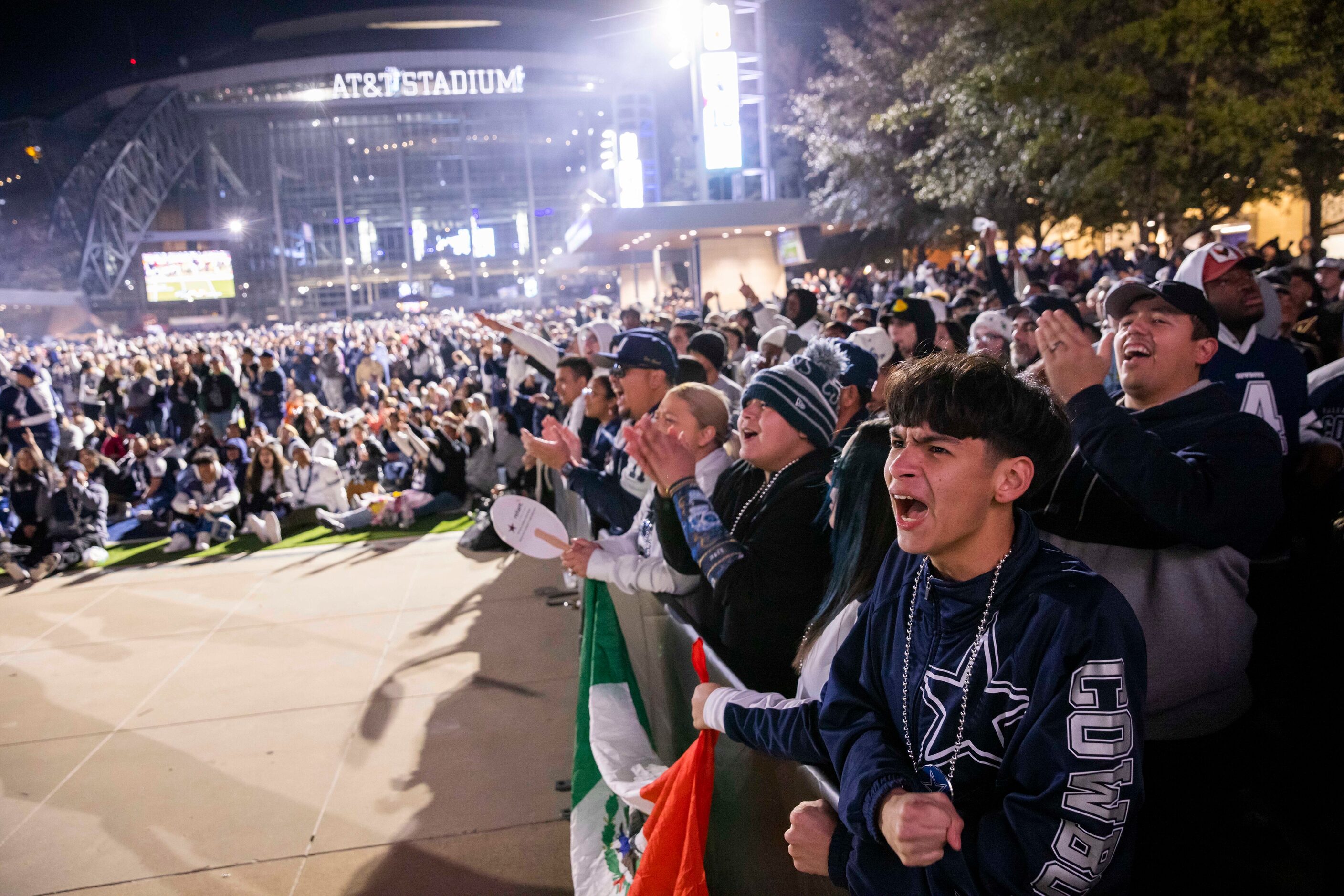 Sevasthian Conteras, 15, cheers the Dallas Cowboys on against the San Francisco 49ers in the...