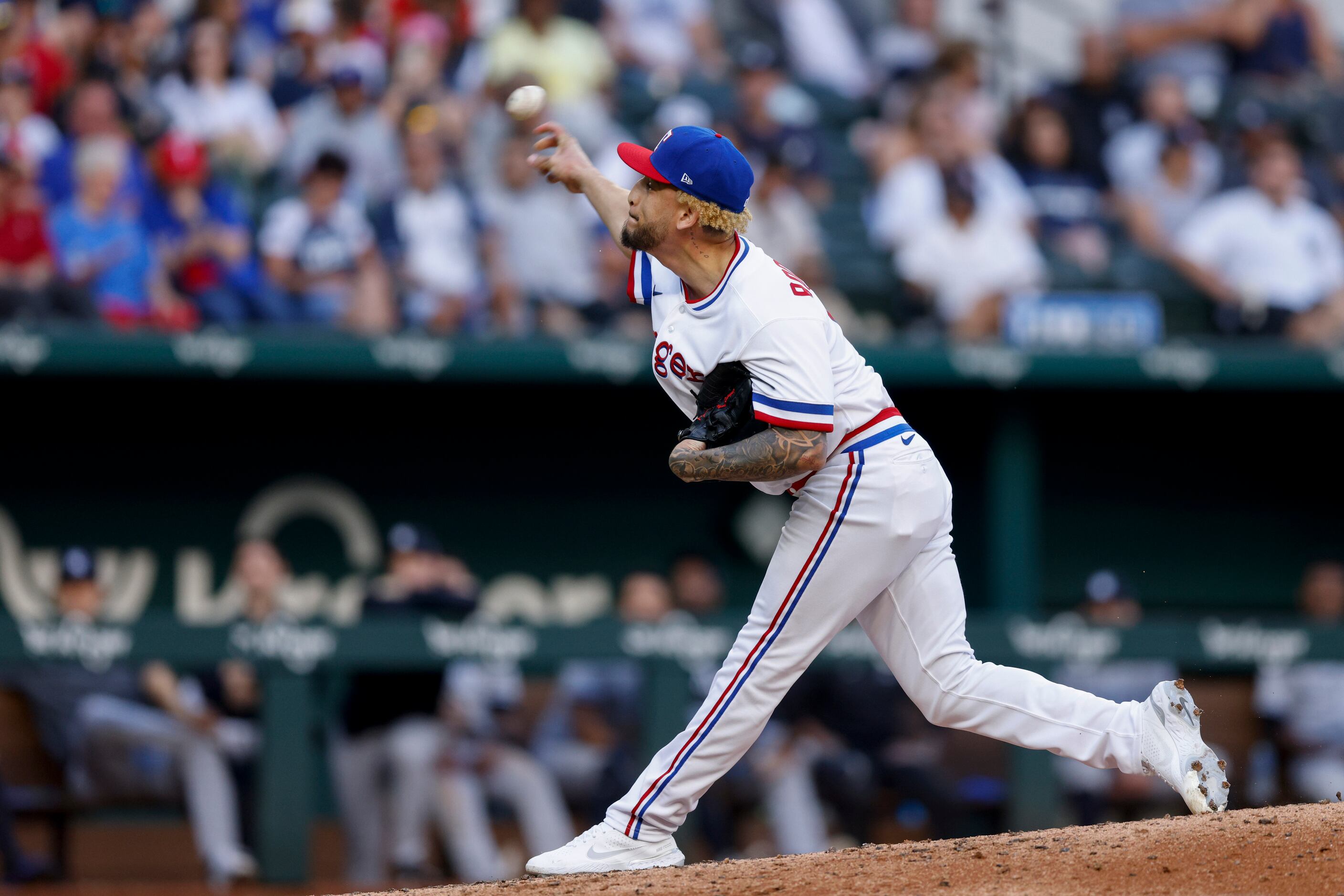 Texas Rangers starting pitcher Yerry Rodriguez (51) delivers a pitch during the seventh...