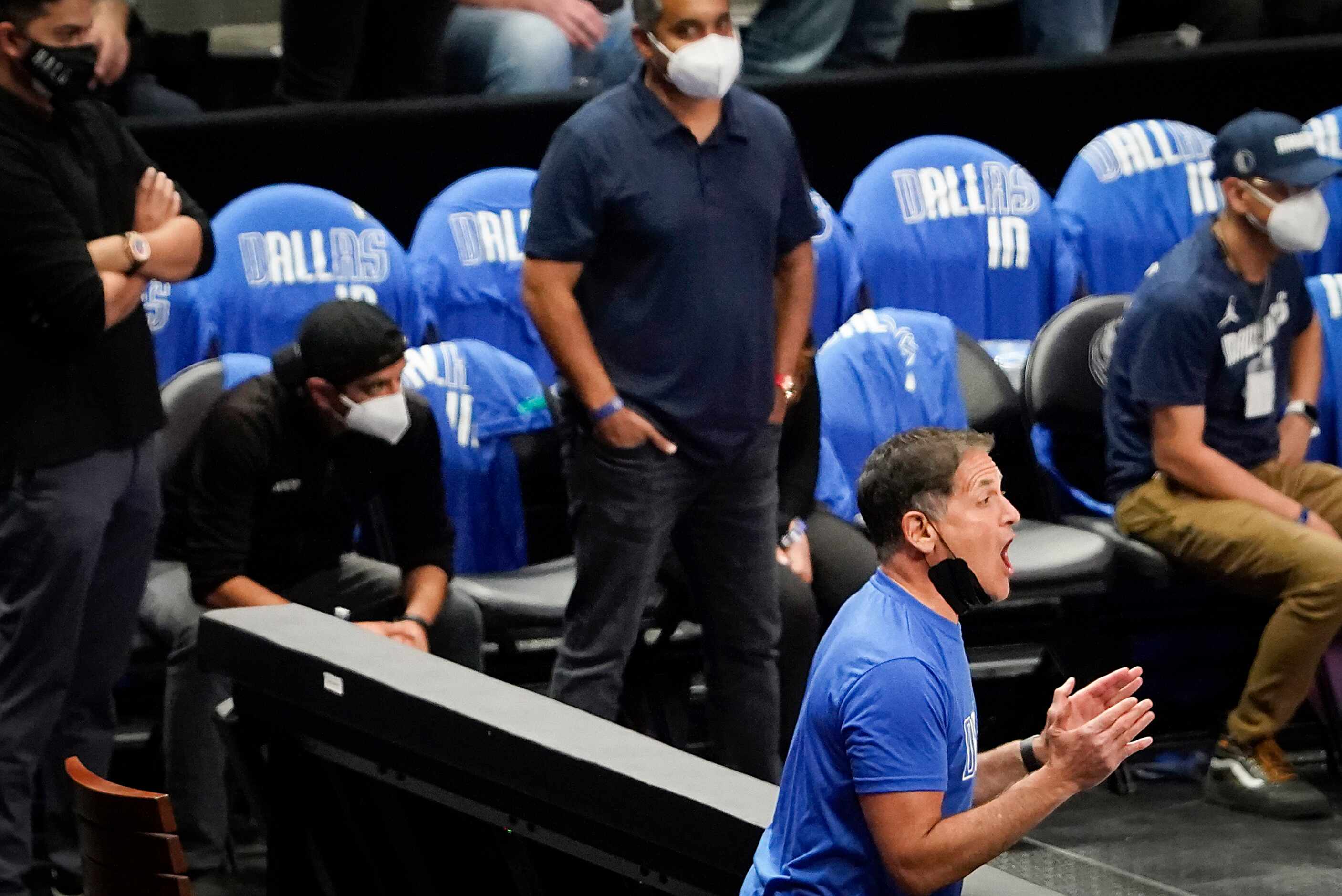 Dallas Mavericks owner Mark Cuban reacts after a foul call went against his team during the...