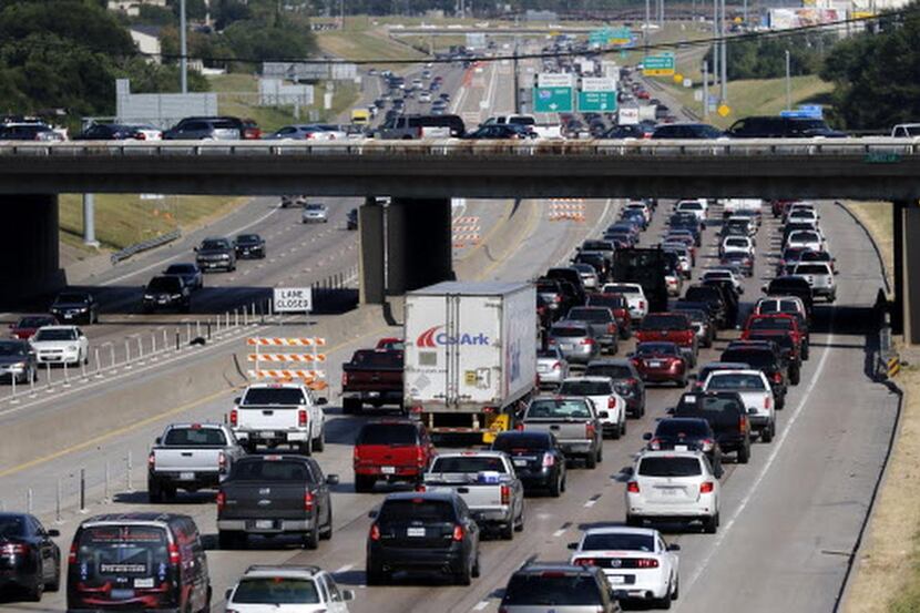 
Traffic slowly moves along Interstate 635 near Abrams Road in Dallas.
