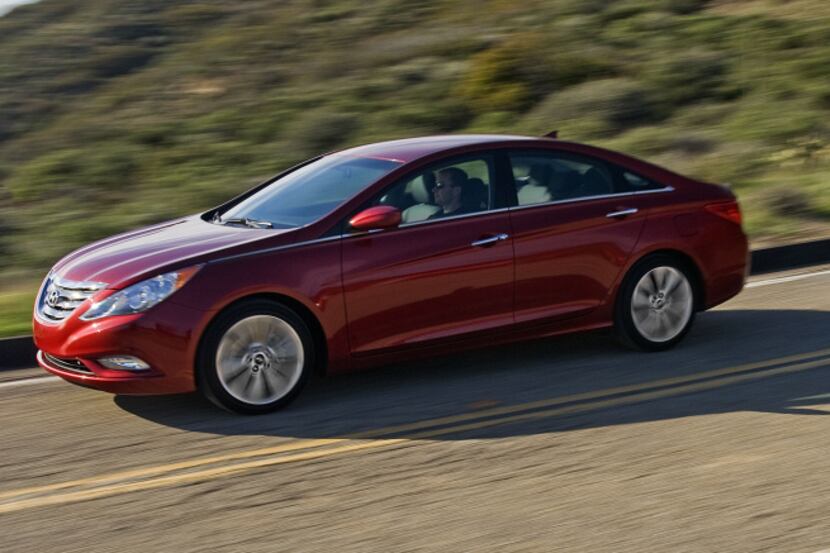 The 2012 Hyundai Sonata SE 2.0T will carry out carpool and errand-running duties, but its...