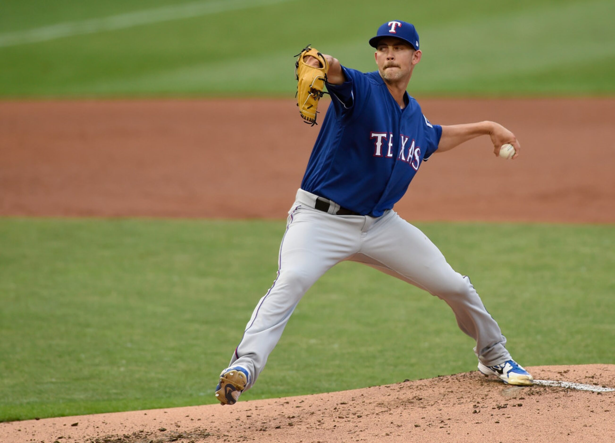 MINNEAPOLIS, MN - JUNE 22: Mike Minor #36 of the Texas Rangers delivers a pitch against the...