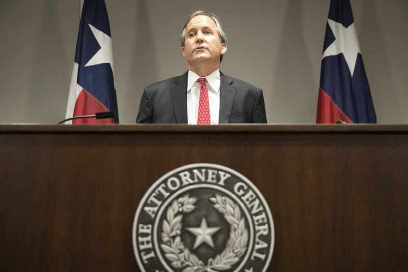 In this 2016 file photo, Attorney General Ken Paxton announces Texas' lawsuit to challenge...