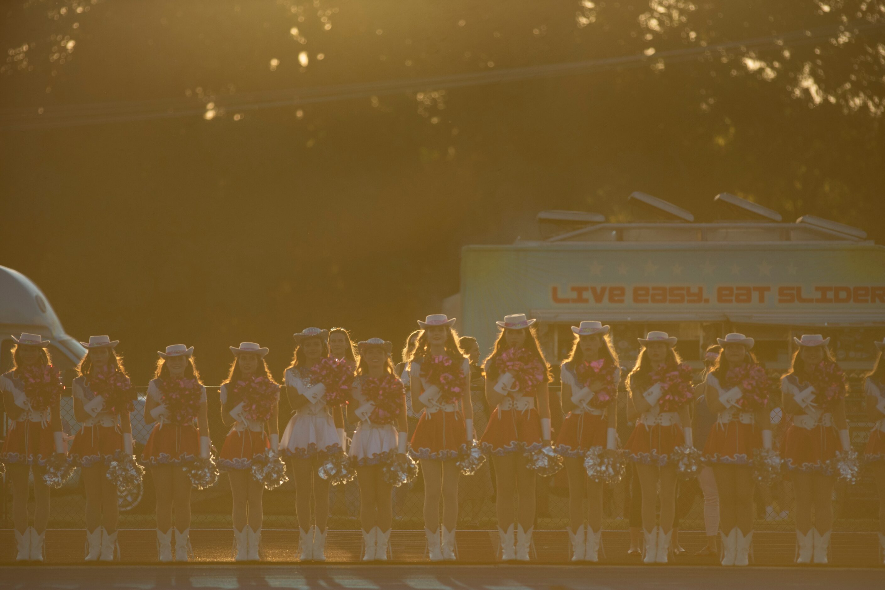 Parish Episcopal cheerleaders line up for the national anthem prior to the start of Parish...