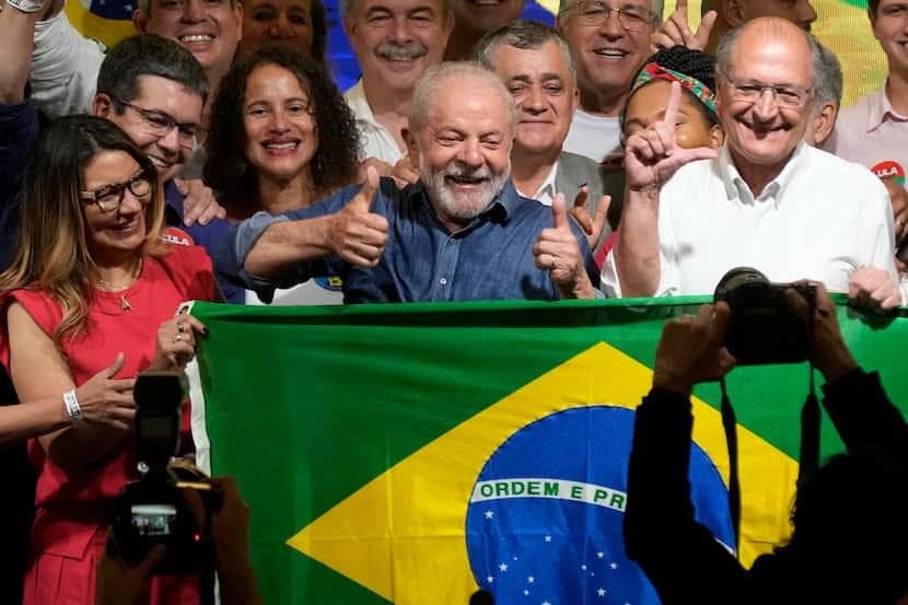 Former Brazilian President Luiz Inacio Lula da Silva celebrates with his wife Rosangela...