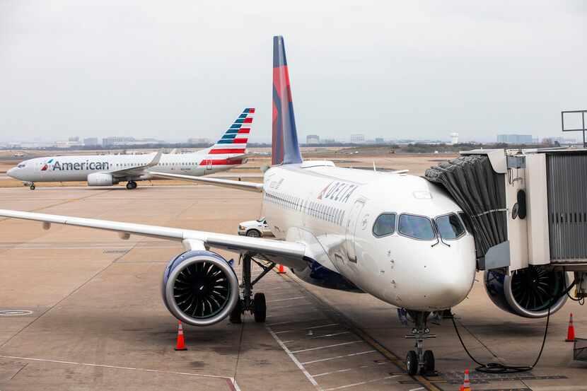 American and Delta are in talks with lenders for loans to help the airline's weather the...