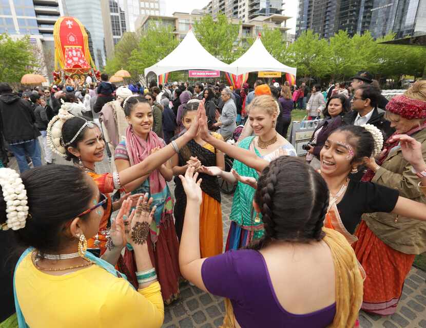 People enjoy music and dancing during the Festival of Joy at Klyde Warren Park in Dallas on...