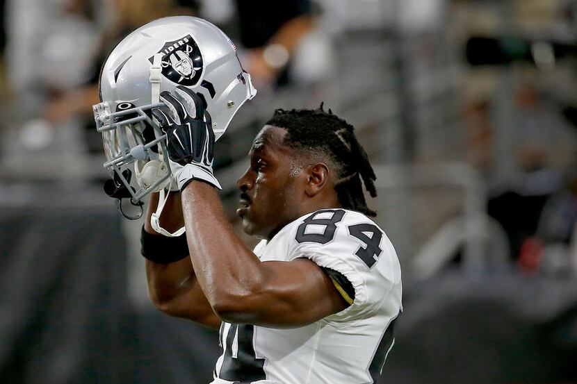 FILE - In this Aug. 15, 2019, file photo, Oakland Raiders wide receiver Antonio Brown (84)...
