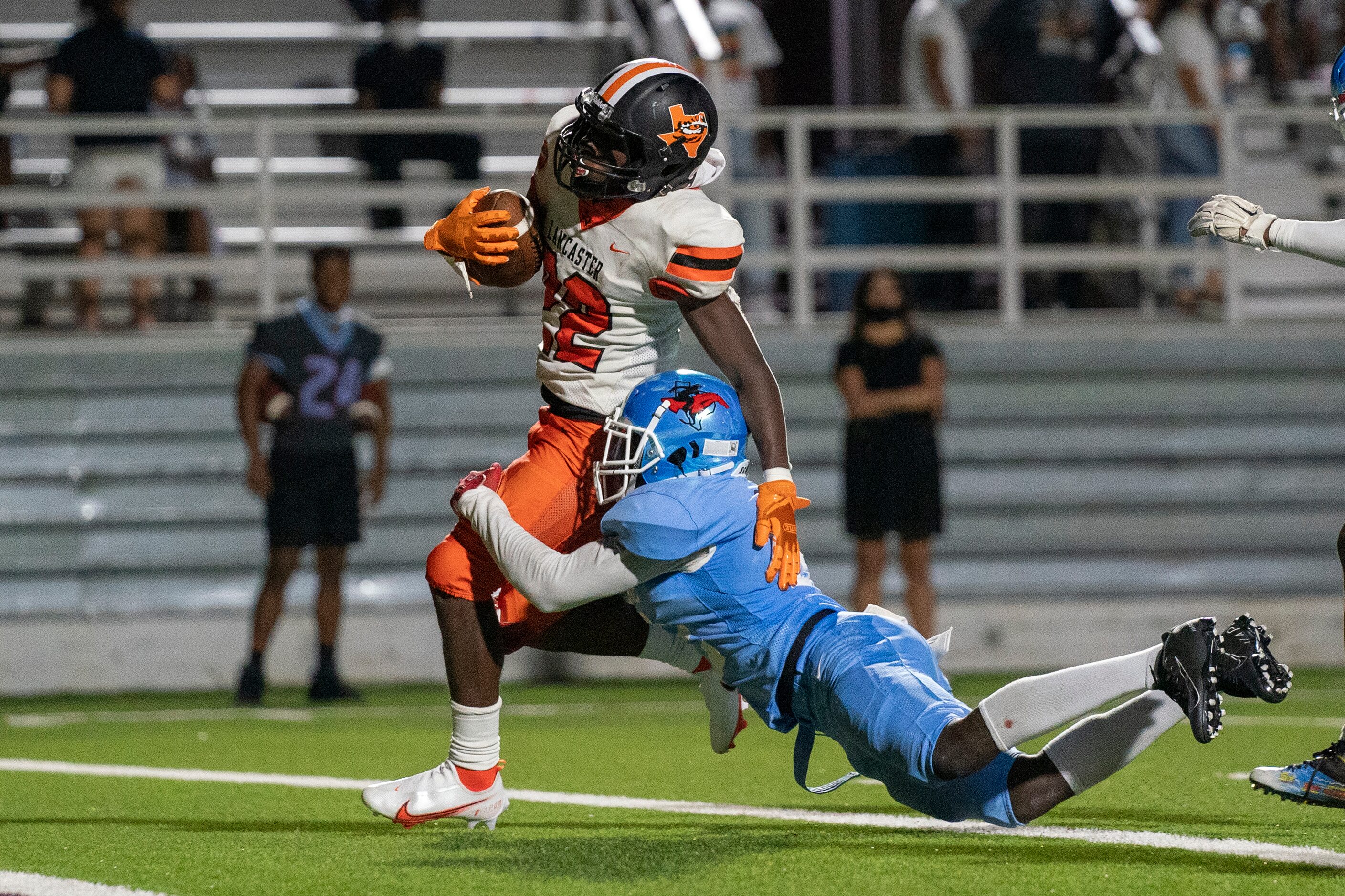 Lancaster running back Brandon Faulkner (22) crosses the goal line ahead of Skyline junior...