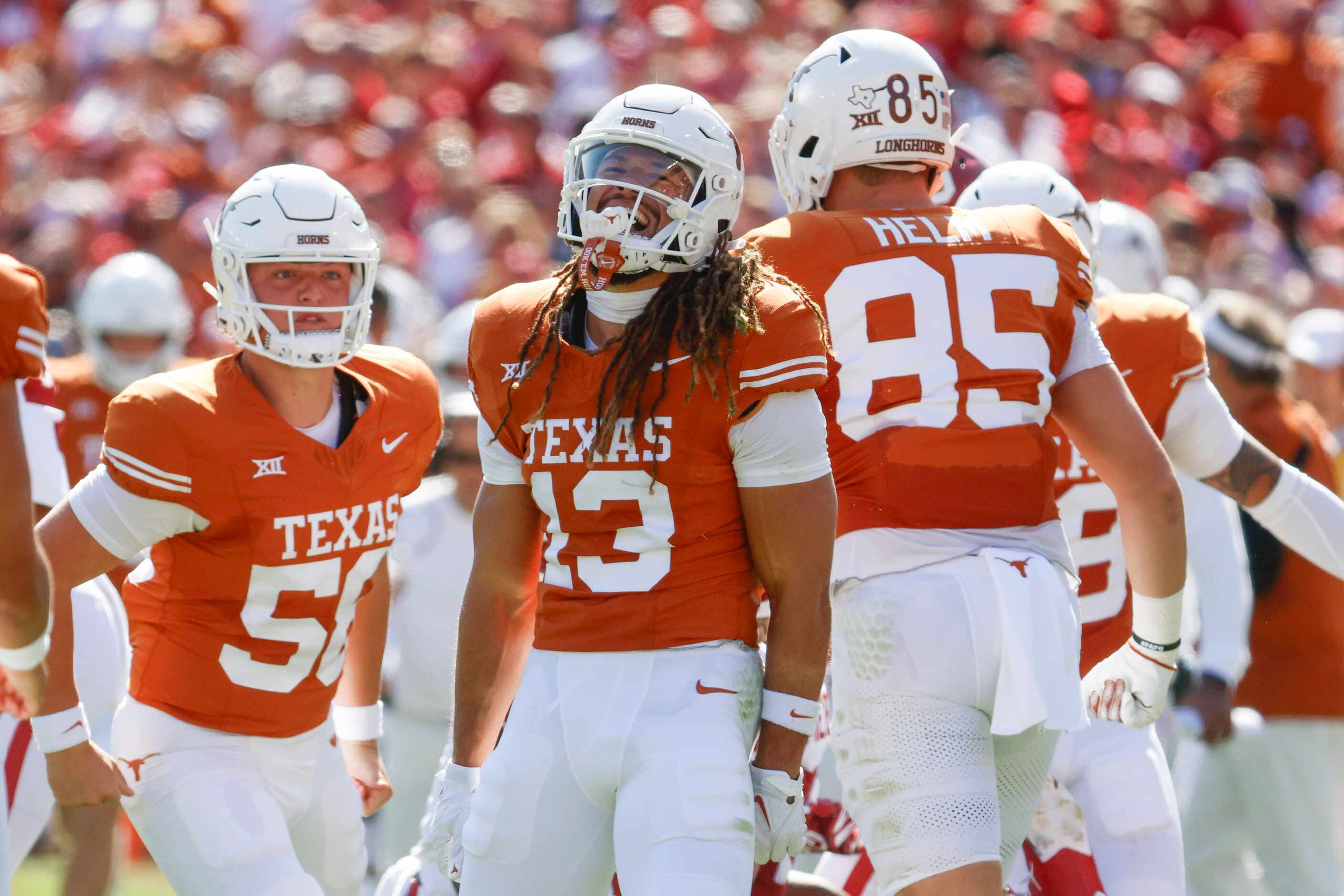 Texas wide receiver Jordan Whittington (13) cheers after a yardage against Oklahoma during...