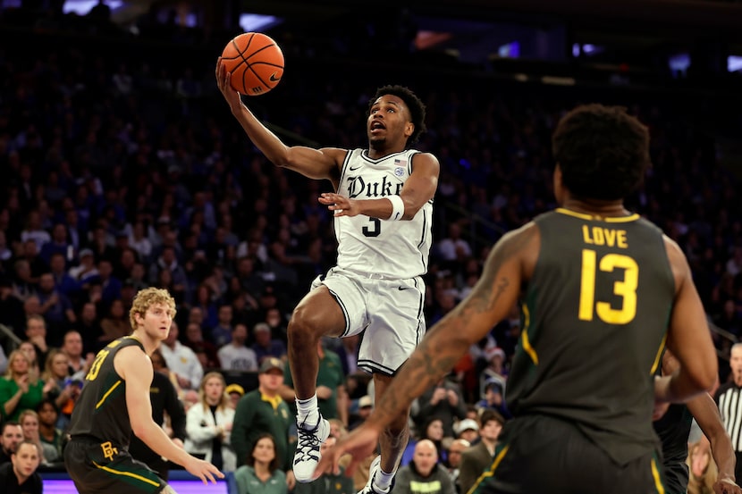 FILE - Duke guard Jeremy Roach drives to the basket past Baylor guard Langston Love (13)...