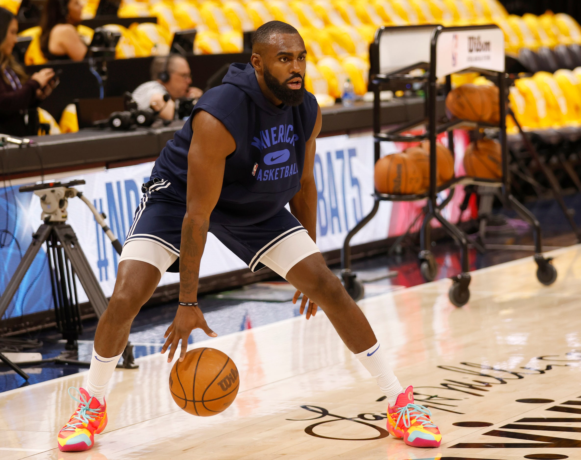 Dallas Mavericks forward Tim Hardaway Jr. (11) dribbles  during warmups of game 4 of an NBA...