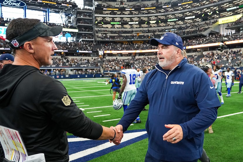 Dallas Cowboys head coach Mike McCarthy shook hands with New Orleans Saints head coach...