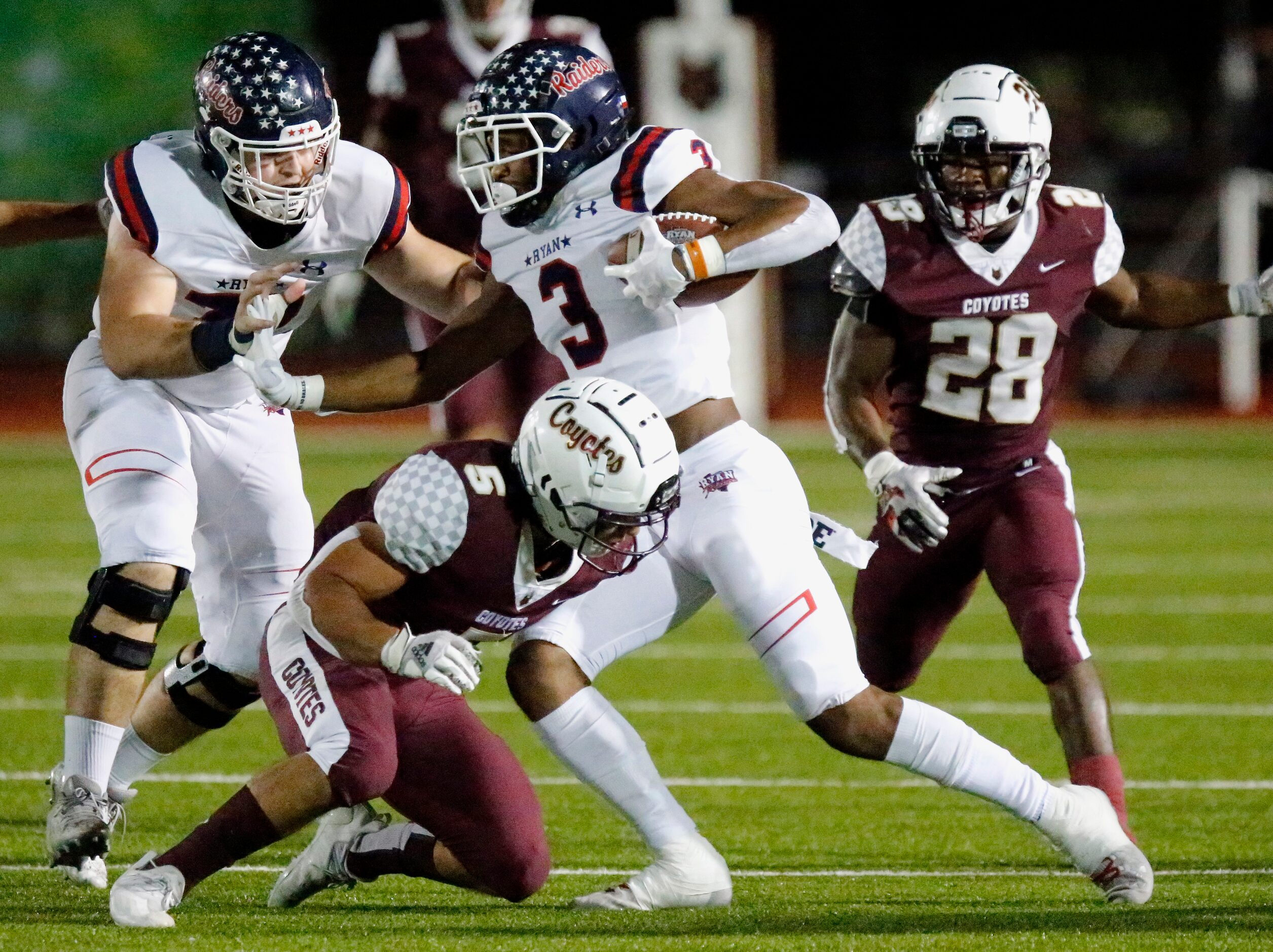 Denton Ryan High School wide receiver Austin Jordan (3) is tackled by Frisco Heritage High...