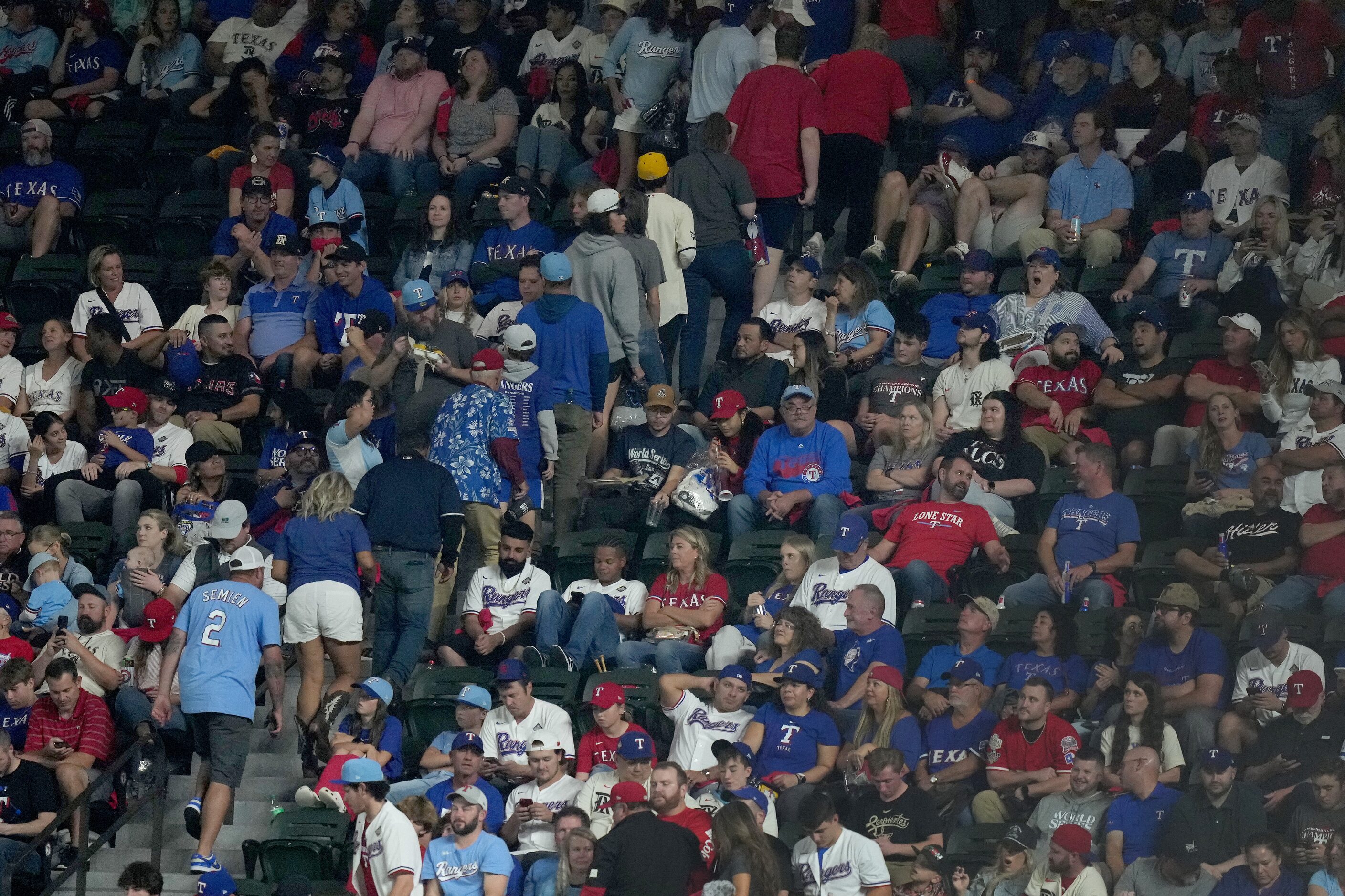 Fans head for the exits during the ninth inning in Game 2 of the World Series between the...