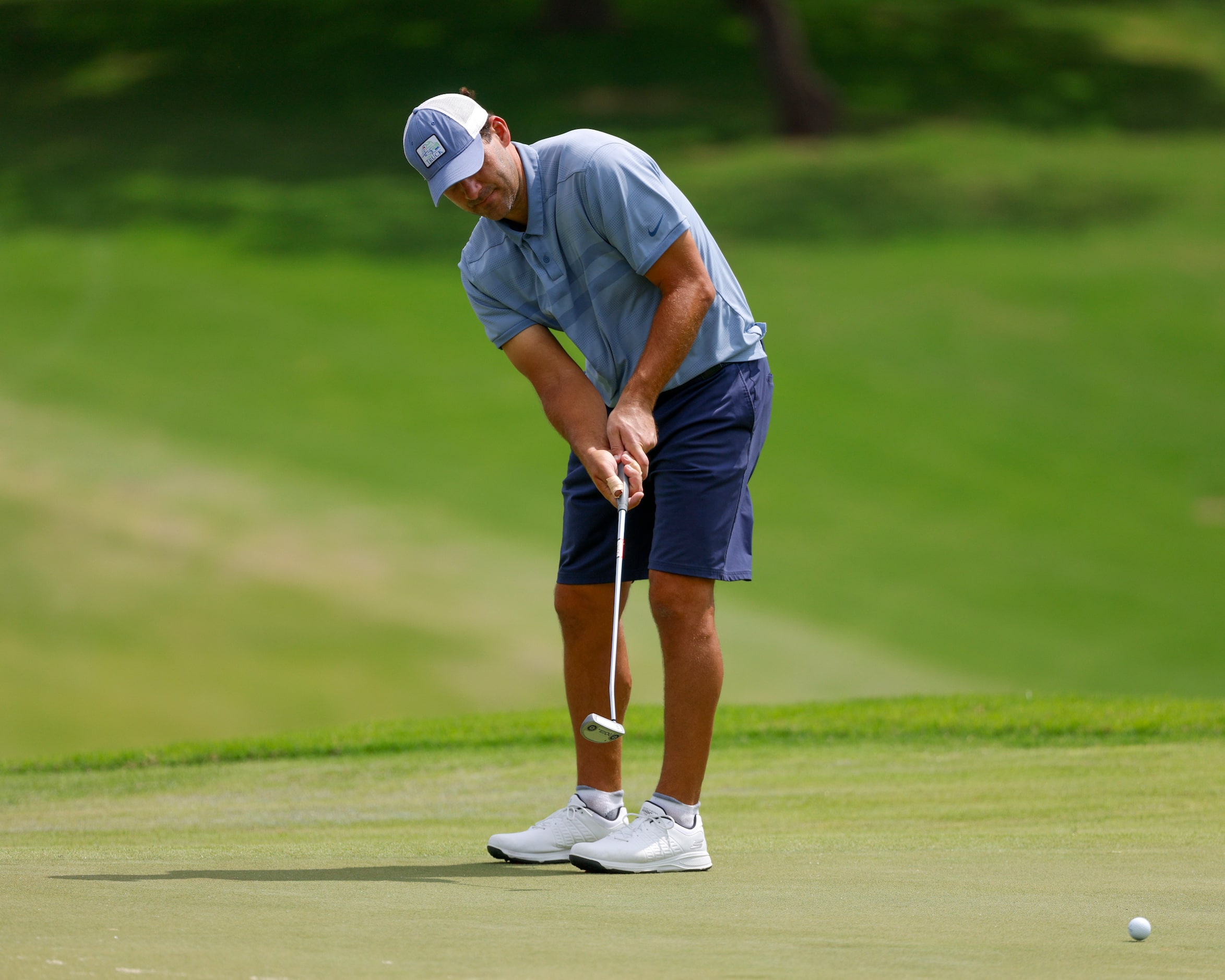 Former Dallas Cowboys quarterback Tony Romo putts on the seventh green during the ClubCorp...