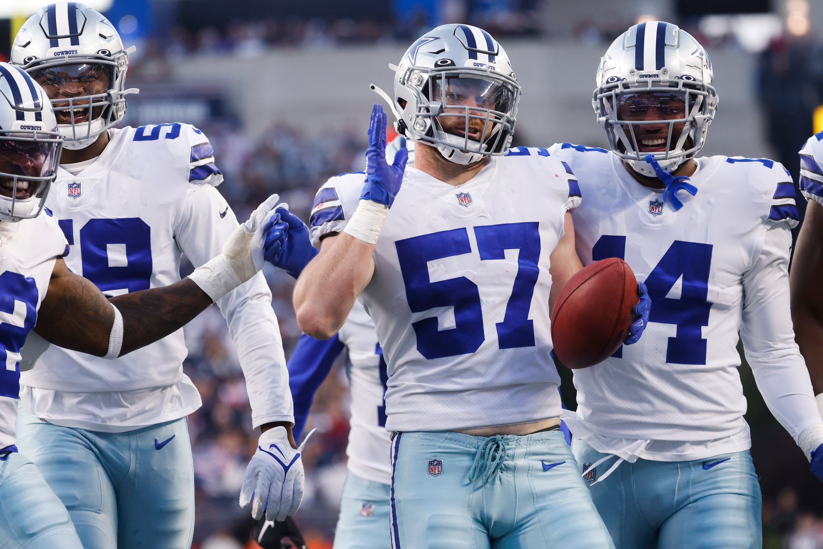 Dallas Cowboys linebacker Luke Gifford (57) celebrates blocking New England Patriots punter...