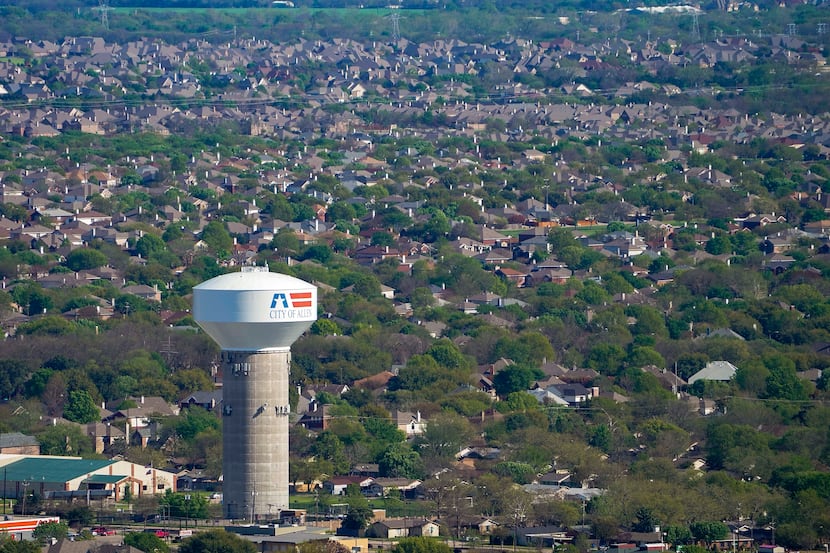 Aerial view of water tower and residential neighborhood in Allen, Texas on March 24, 2020.