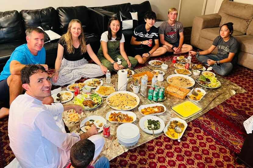 Reggie’s family hosts Heather Gray Blalock’s family for an Afghan family meal in Fort Worth....
