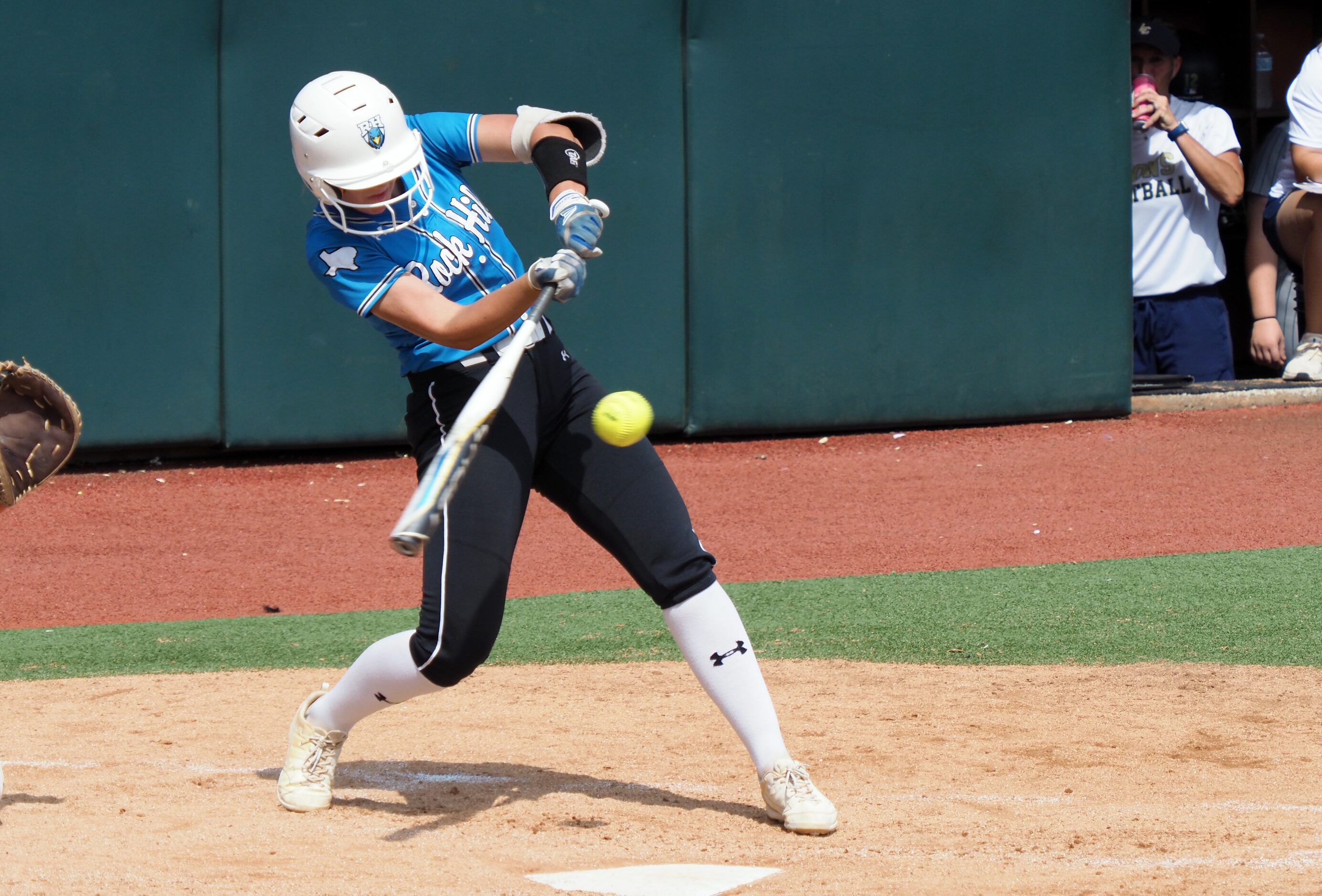 Prosper Rock Hill batter Ella Berlage hits the ball against Montgomery Lake Creek in the...