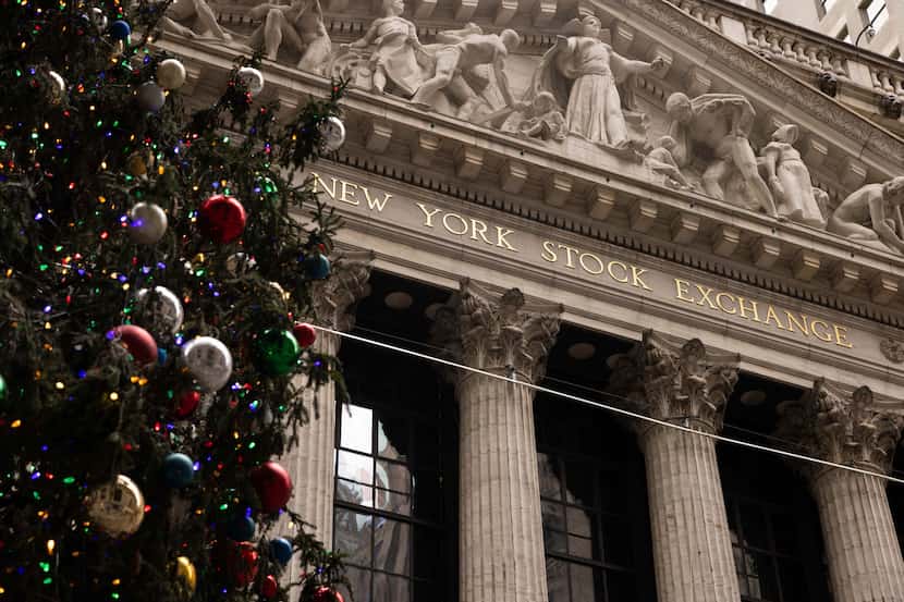 A Christmas tree stands in front of the New York Stock Exchange, Monday, Dec. 11, 2023, in...