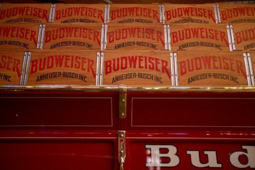 Wooden beer cases are seen on display inside a stable for the Budweiser Clydesdales during...