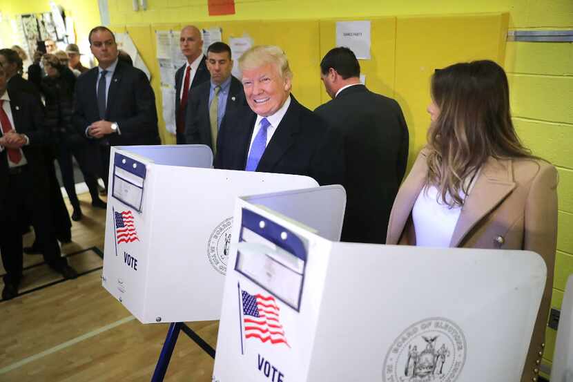  Donald Trump and his wife, Melania, cast their votes on Election Day at PS 59 in New York...