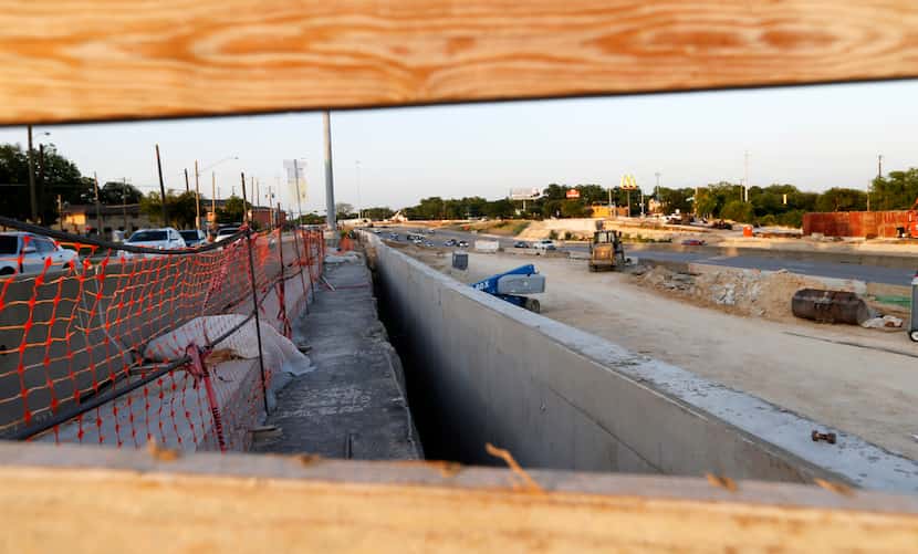 A construction area for the Southern Gateway deck park's concrete foundation is visible at...
