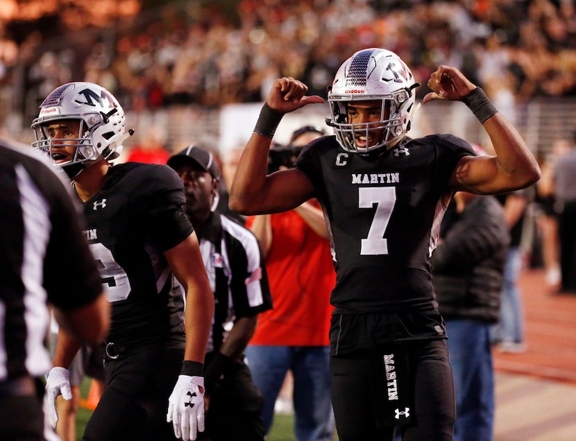 Arlington Martin player Brayden Willis (7) celebrates a touchdown against Odessa Permian...