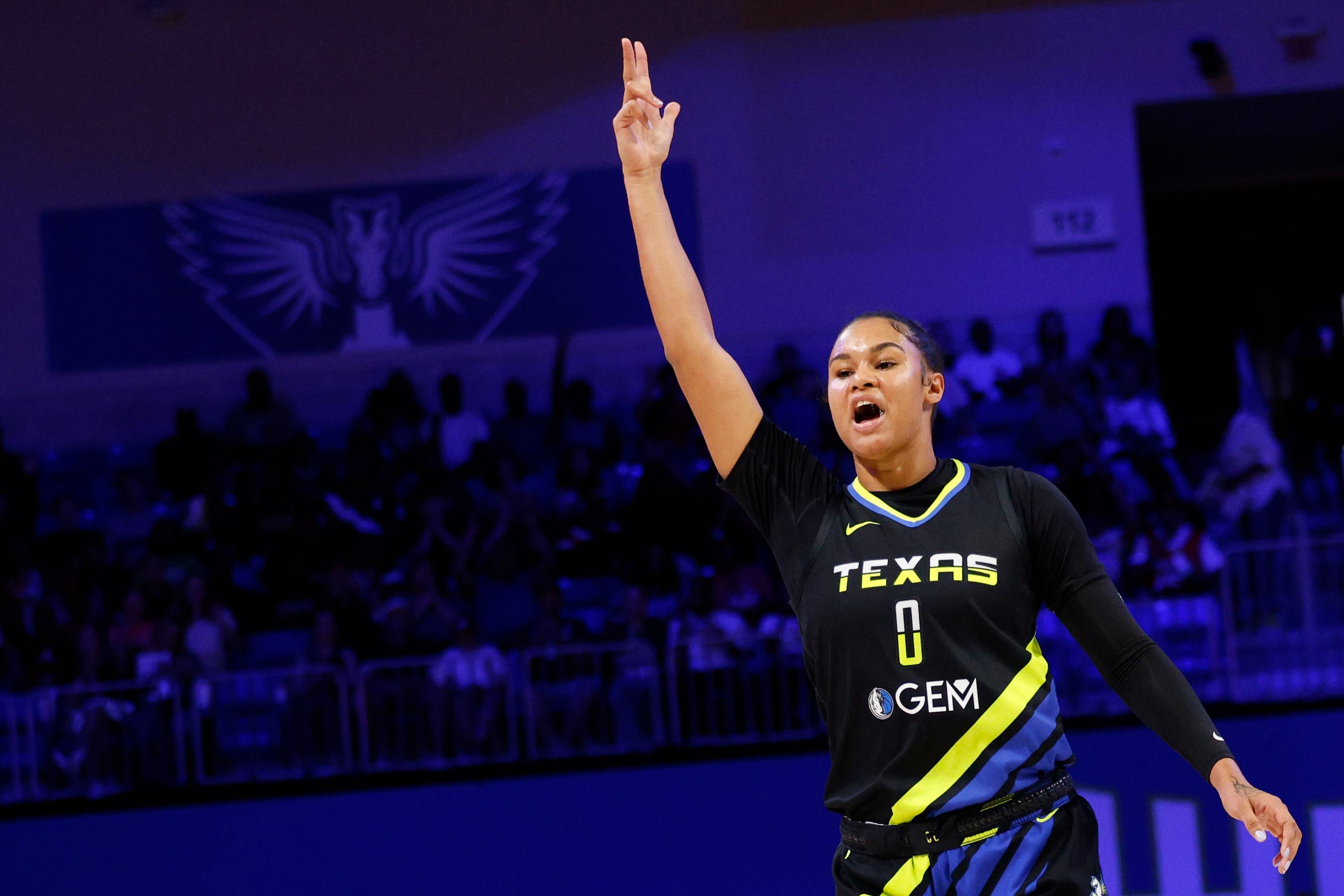 Dallas Wings forward Satou Sabally (0) reacts after scoring against the Connecticut Sun...