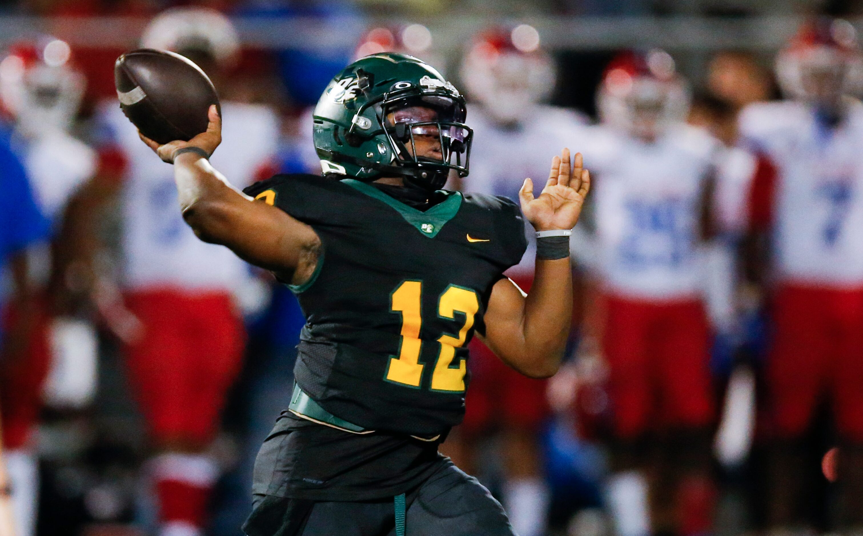 DeSoto senior quarterback throws during the second half of a high school football game...