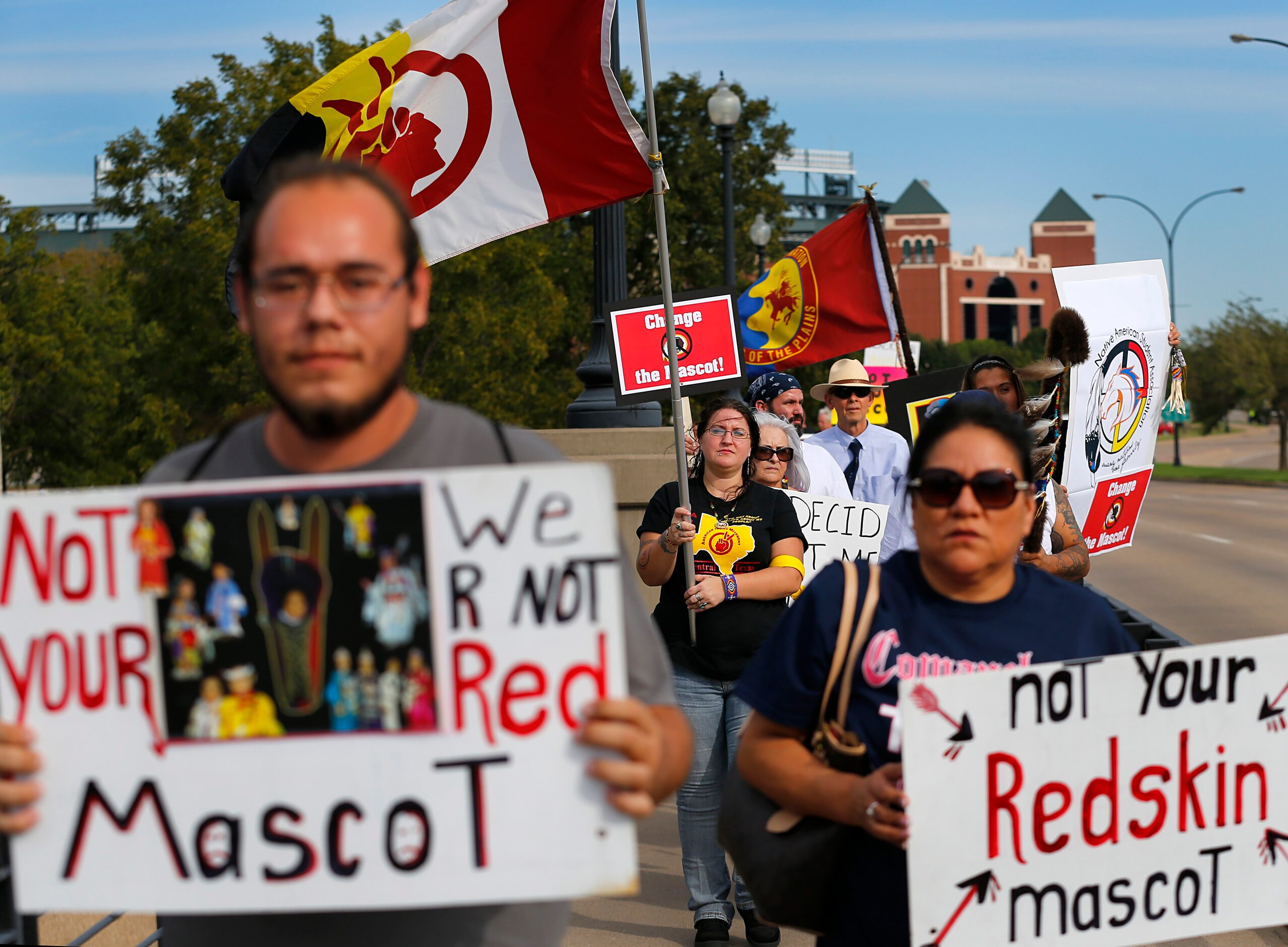 A couple of dozen anti-Redskins protestors marched up and down Randol Mill Rd in front of...