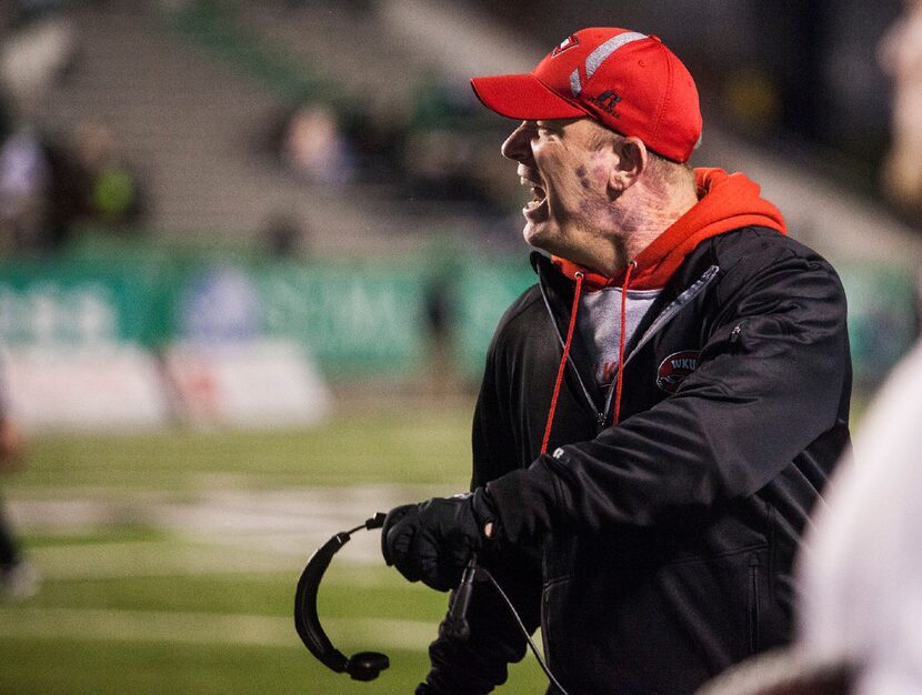 Western Kentucky coach Jeff Brohm shouts at a player during Western Kentucky's 60-6 win over...