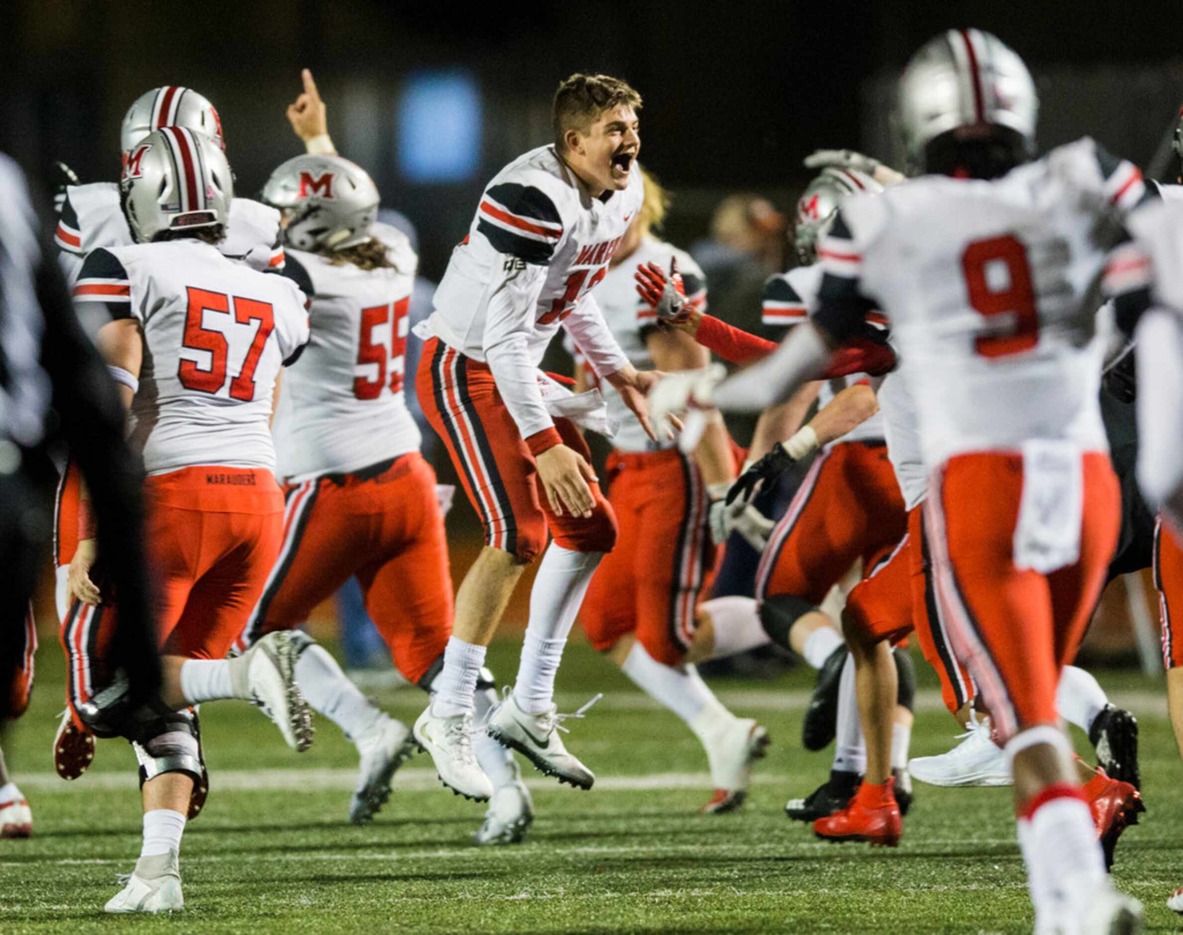 Flower Mound Marcus celebrates a 34-31 win over Flower Mound on Friday, October 25, 2019 at...