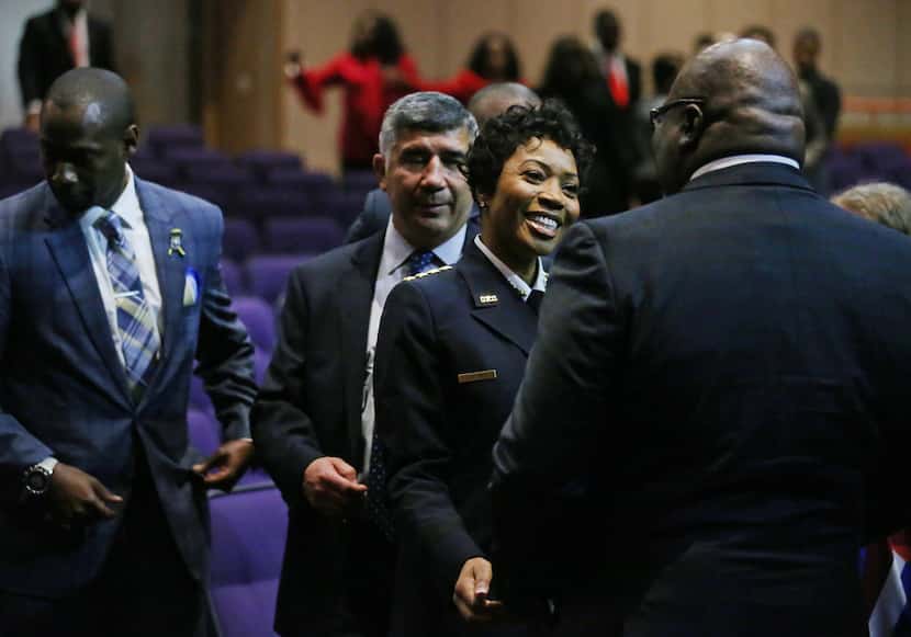 Dallas Police Chief U. Renee Hall greets Bishop T.D. Jakes after her swearing-in. 