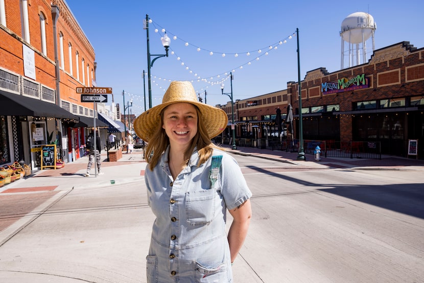 Andrea Holmes, in McKinney on Friday, March 3, 2023, is a local mural artist who has painted...