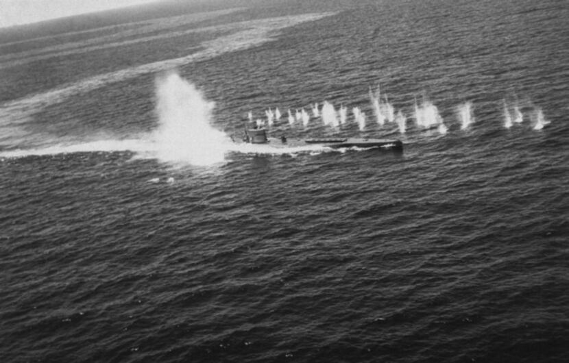 From "Blackett's War," by Stephen Budiansky: "U-118 under depth charge and machine gun...