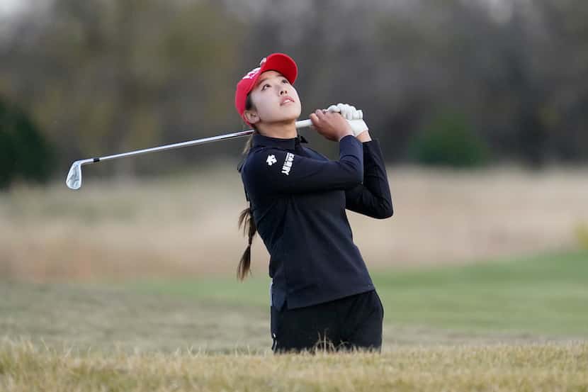 Yealimi Noh watches her shot from a sand trap on the 18th hole during the third round of the...