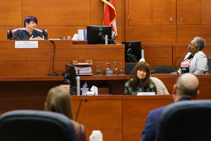 Marsha Jackson, right, is questioned by state District Judge Gena Slaughter, left, during a...